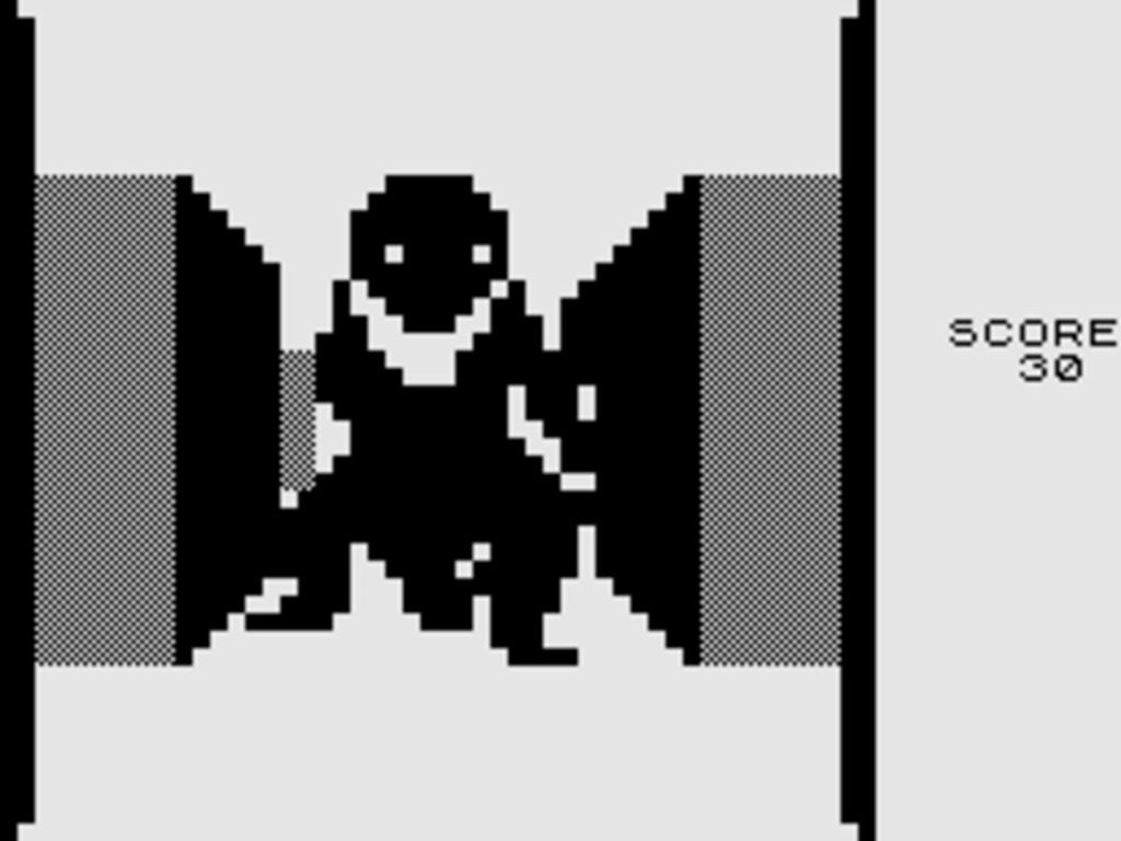 3D Monster Maze sur ZX81, la silhouette pixelisée du tyrannosaure entre deux murs du labyrinthe, en noir et blanc