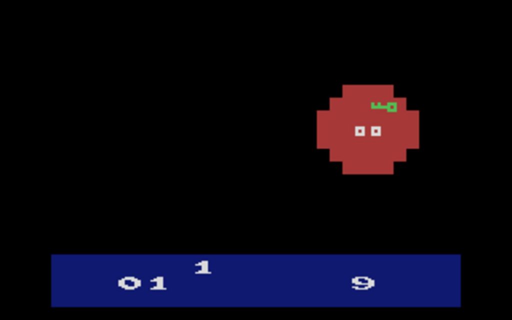 Écran noir d'Haunted House sur Atari 2600, un ennemi rouge isolé au centre et la barre de score bleue en bas
