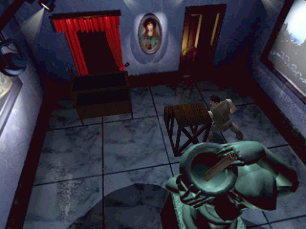 Resident Evil sur PlayStation, caméra fixe en hauteur sur une chambre bleutée, un zombie au sol au premier plan