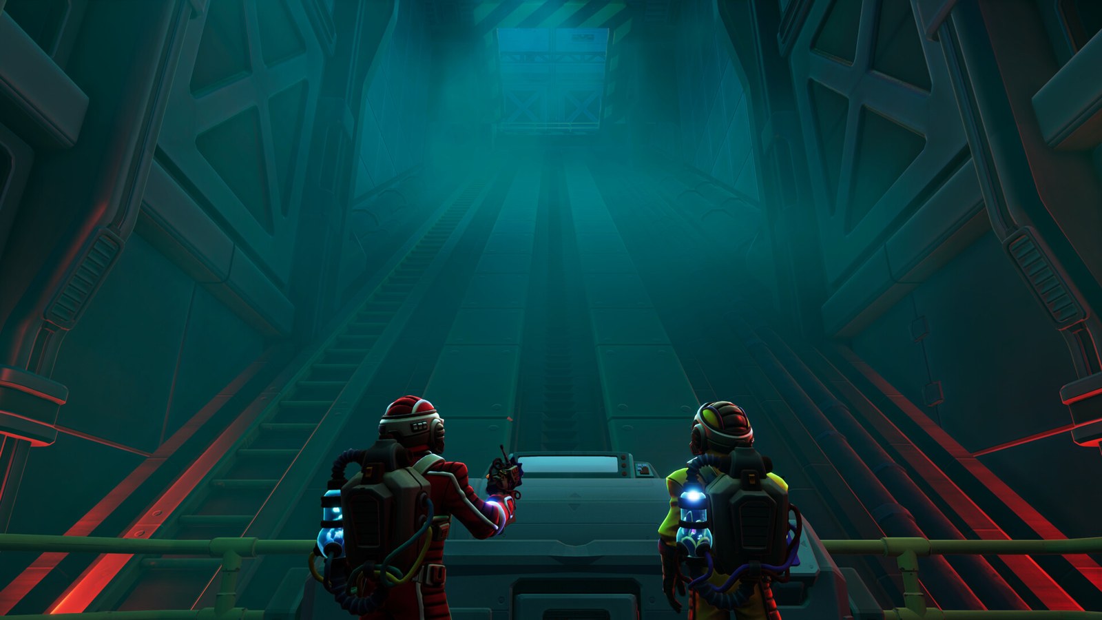 Deux explorateurs en combinaison, de dos, face à un immense puits baigné de lumière turquoise, dans We Were Here Tomorrow.