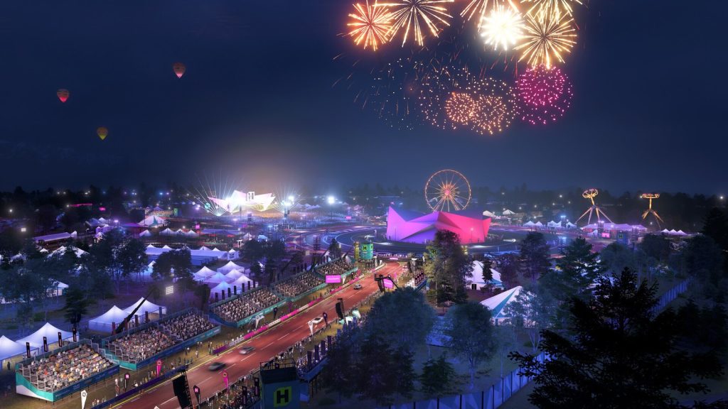 Un festival vu du ciel la nuit, avec une grande roue, des tentes illuminées et un feu d'artifice.